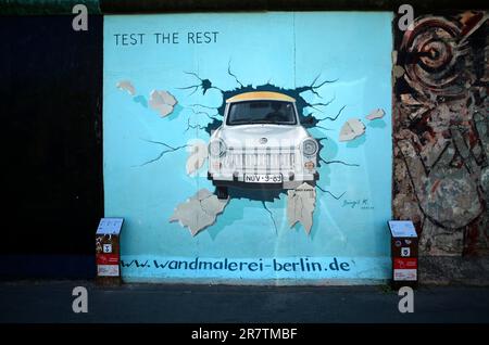 Birgit Kinder, Trabbi, Trabant (Test the Rest), artwork on the former Berlin Wall, graffiti, East Side Gallery, Berlin, Germany Stock Photo