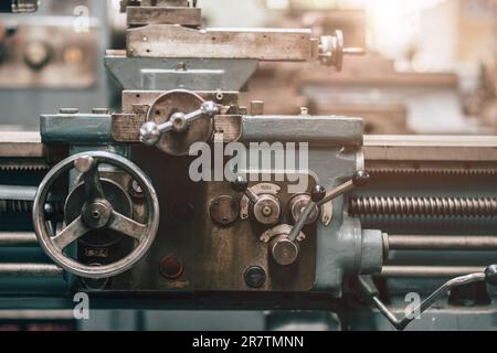 Old Precision CNC Lathe Machine Rotor Milling in Heavy Metal Factory. Stock Photo