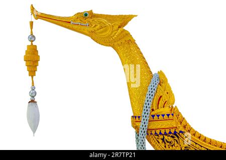 Suphannahong Royal Barge Closeup the boat bow wooden swan carved beautiful golden paint isolated on white background with clipping path. Stock Photo