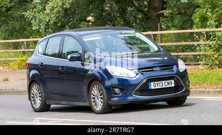Milton Keynes,UK - June 18th 2023: 2013 blue diesel engine FORD C-MAX   car travelling on an English road Stock Photo