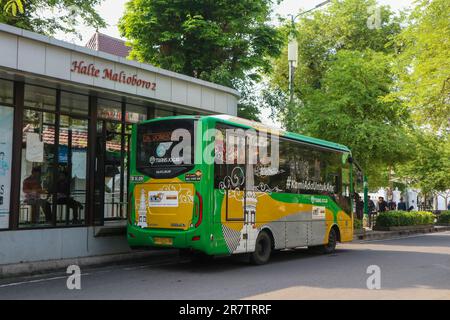 Yogyakarta, Indonesia - March 20, 2023: The Trans Jogja bus is stopping at the bus stop on Jalan Malioboro Stock Photo