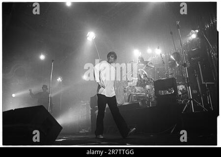 MANI, THE STONE ROSES, BASSIST, 1994: Mani (Gary Mounfield) the bassist of The Stone Roses playing at Newport Centre in Newport, Wales, UK on a tour to promote their 'Love Spreads' single and 'Second Coming' album, 4 December 1994. Photo: Rob Watkins Stock Photo