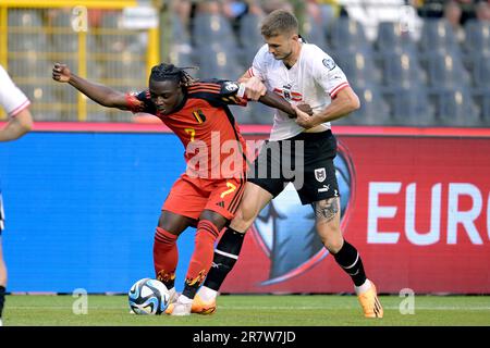 BRUSSELS - (lr) Jeremy Doku of Belgium, Patrick Wimmer of Austria ...