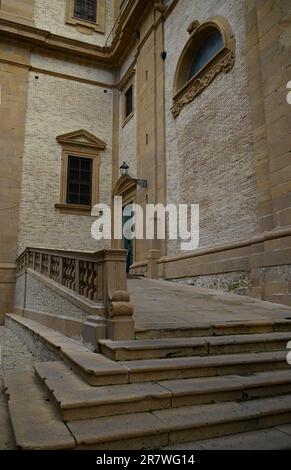 Scenic side entrance view of the Sicilian Baroque and Gothic style Cattedrale di Maria Santissima delle Vittorie in Piazza Armerina Sicily, Italy. Stock Photo
