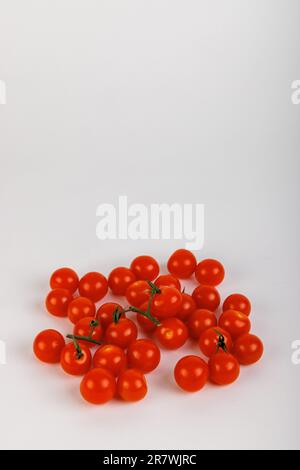 Tomatos red and freash on white background Stock Photo