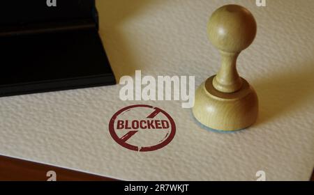 Blocked stamp and stamping hand. Permitted ban and prohibition concept. Stock Photo