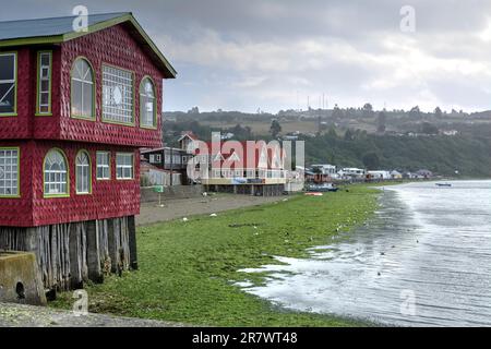 The Palafitos of Chiloe - colorful wooden houses on stilts along the river, Castro, Chiloe Island, Chile Stock Photo