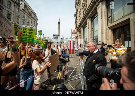 London, United Kingdom - June 17th 2023:  Vicar heckles Abortion Rights Protesters during their march to Downing Street. Stock Photo