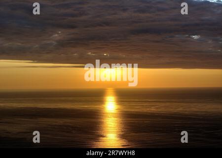 A stunningly beautiful sunset over the Pacific Ocean on the coast of Chile in the Pichilemu area Stock Photo