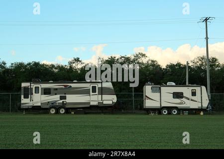 Travel trailers parked outdoors. Home on wheels Stock Photo