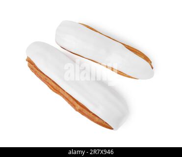 Two delicious eclairs covered with glaze isolated on white, top view Stock Photo
