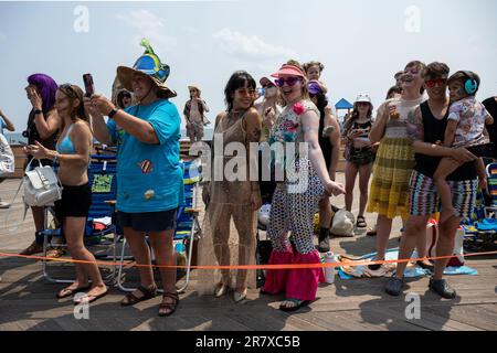 New York, USA. 17th June, 2023. Revelers line the boardwalk for the 41st annual Mermaid Parade in Coney Island in Brooklyn, New York, on June 17, 2023. (Photo by Gabriele Holtermann/Sipa USA) Credit: Sipa USA/Alamy Live News Stock Photo