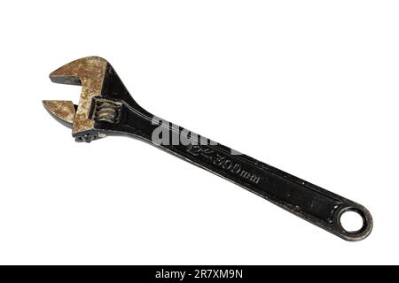 Used wrench on isolated white background closeup. Stock Photo