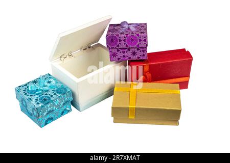 Gift boxes of various sizes and colors isolated on a white background. Stock Photo