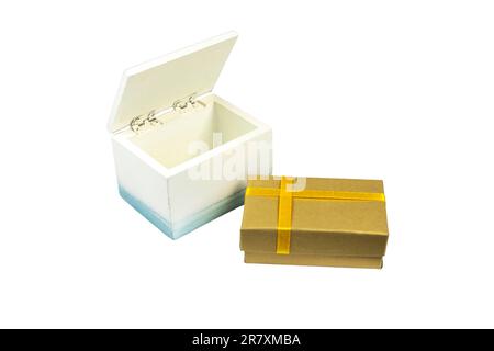 Empty wooden gift box with a golden cartoon gift box isolated on white background. Stock Photo