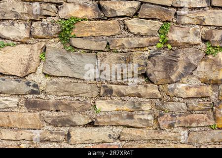 Stone wall texture. Background of stone wall texture. Stone wall texture Stock Photo