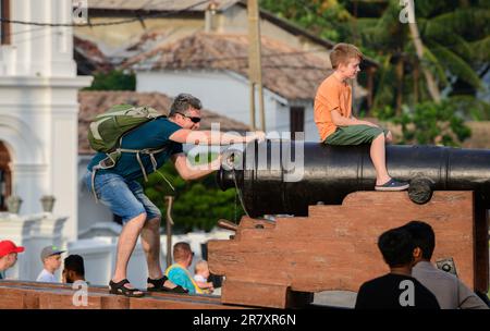 Galle, Sri Lanka - 02 15 2022: Father and son bonding time, fun activities for tourists on Galle fort. Stock Photo