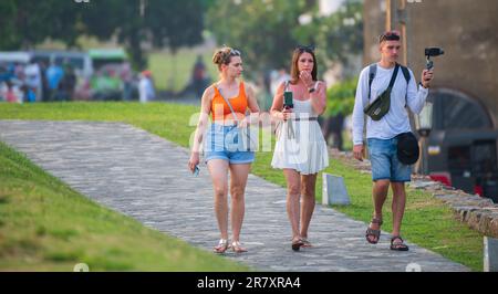 Galle, Sri Lanka - 02 15 2022: Three friends enjoying the vacation on the tropical island of Sri Lanka. Stock Photo