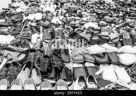 Shoe sale on the farmers market in the village Tymbaki in south-central of Crete. The street markets are traditional at the weekend in the streets of Stock Photo