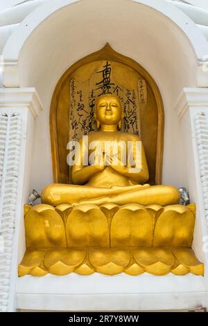 Temple art at the Stupa of the Japanese Peace Pagoda on top of the Rumassala hill in the Jungle of Unawatuna, close to the city Galle Stock Photo