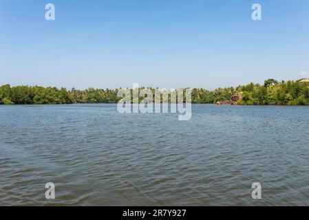 Coastal lagoon named Hikkaduwa lake in the north-east of the city. With its monitor lizards and numerous birds, it is a very pleasant excursion away Stock Photo