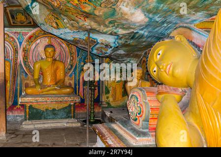 Buddha figures in the 1500-year-old and most important cultural-historical temple of the region Tangalle, the Mulkirigala Raja Maha Vihara. The Stock Photo