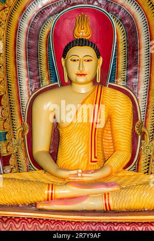 Buddha figures in the 1500-year-old and most important cultural-historical temple of the region Tangalle, the Mulkirigala Raja Maha Vihara. The Stock Photo