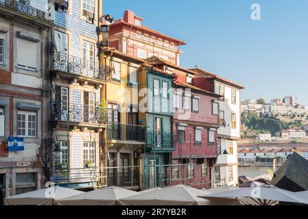 Typical old townhouses of Portuguese architectural style in Porto at the Ribeira Square Stock Photo