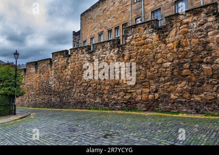 Telfer Wall in city of Edinburgh in Scotland, Old Town defensive stone wall, historic fortification at Vennel St. Stock Photo