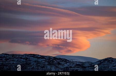 Lenticular clouds, Altocumulus lenticularis in winter in Norway Stock Photo