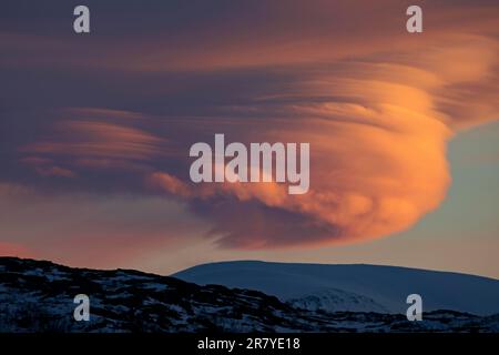 Lenticular clouds, Altocumulus lenticularis in winter in Norway Stock Photo