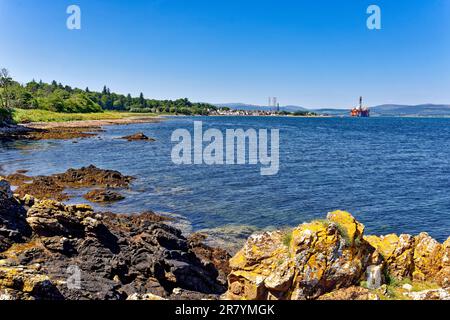 Cromarty Scotland Cromarty Firth blue sky and looking across to Cromarty from the shore of South Sutor in early summer Stock Photo