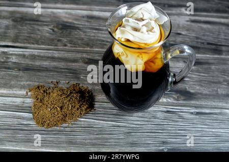 crushed and peeled licorice, Liquorice Glycyrrhiza glabra, a flowering plant of the bean family Fabaceae, A popular drink in Ramadan month Erksos Erqs Stock Photo
