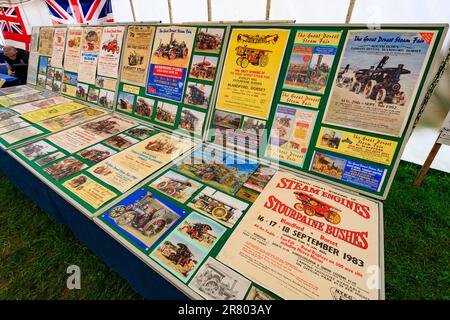 A display of vintage posters for steam and traction engine rallies at the Abbey Hill Steam Rally, Yeovil, Somerset, England, UK Stock Photo