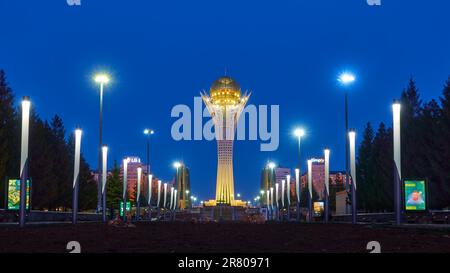 Astana, Kazakhstan - April 4, 2023: Night view of Nurjol Boulevard with Baiterek tower in Astana city (formerly Nur-Sultan) Stock Photo