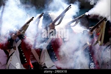 Re-enactors recreate the battle of Enniscorthy Bridge in Enniscorthy, Co Wexford to mark the 225th anniversary of the 1798 rebellion between the United Irish men and the forces of the Crown. Picture date: Sunday June 18, 2023. Stock Photo