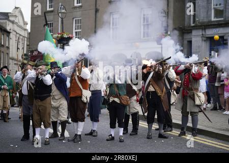 Re-enactors recreate the battle of Enniscorthy Bridge in Enniscorthy, Co Wexford to mark the 225th anniversary of the 1798 rebellion between the United Irish men and the forces of the Crown. Picture date: Sunday June 18, 2023. Stock Photo