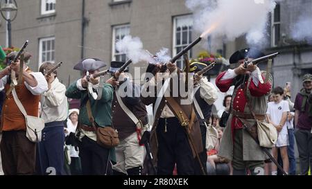 Re-enactors recreate the battle of Enniscorthy Bridge in Enniscorthy, Co Wexford to mark the 225th anniversary of the 1798 rebellion between the United Irish men and the forces of the Crown. Picture date: Sunday June 18, 2023. Stock Photo