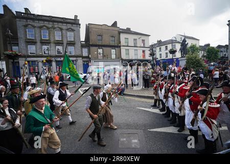 Re-enactors recreate the battle of Enniscorthy Bridge in Enniscorthy, Co Wexford to mark the 225th anniversary of the 1798 rebellion between the United Irish men and the forces of the Crown. Picture date: Sunday June 18, 2023. Stock Photo