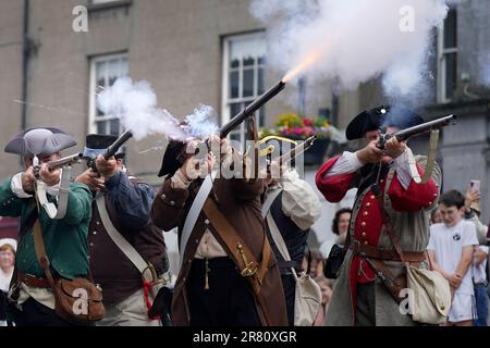 Re-enactors recreate the battle of Enniscorthy Bridge in Enniscorthy, Co Wexford to mark the 225th anniversary of the 1798 rebellion between the United Irish men and the forces of the Crown. Picture date: Sunday June 18, 2023. Stock Photo