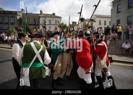 Re-enactors recreate the battle of Enniscorthy Bridge in Enniscorthy, Co Wexford to mark the 225th anniversary of the 1798 rebellion between the United Irish men and the forces of the Crown. Picture date: Sunday June 18, 2023. Stock Photo