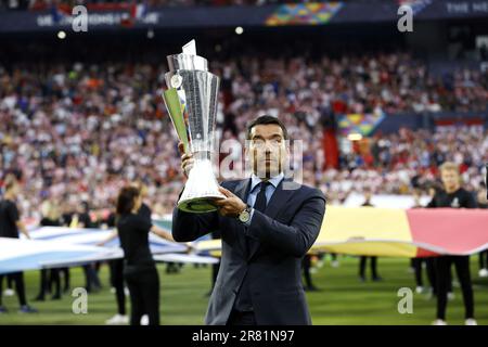 ROTTERDAM - Giovanni van Bronckhorst with the Nations League cup during the UEFA Nations League final match between Croatia and Spain at Feyenoord Stadion de Kuip on June 18, 2023 in Rotterdam, Netherlands. ANP MAURICE VAN STONE Stock Photo
