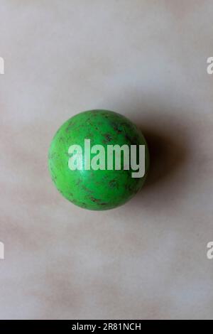 Sphere of different colors. Roller hockey ball resting on the skating rink. Stock Photo