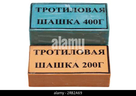 TNT blocks 200 and 400 gram. russian/soviet type isolated on white background. Inscription in russian on the photo: 'TNT block 400/200 grams' Stock Photo