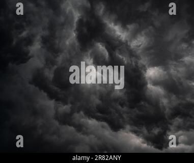 Dar summer storm clouds gather over Worcestershire threatening a thunder storm. Stock Photo
