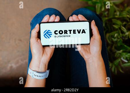 In this photo illustration, the Corteva, Inc. logo is displayed on a smartphone screen. Stock Photo