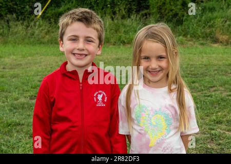 Vickerstown, Co. Laois, Ireland. 18th June, 2023. The Irish Harness Racing Association (IHRA) held the first ever race meeting in Vickerstown today. A 9 race card proved popular with a large crowd of spectators. At the races were Lucas and Kaitlyn Stewart from Portrush. Credit: AG News/Alamy Live News Stock Photo