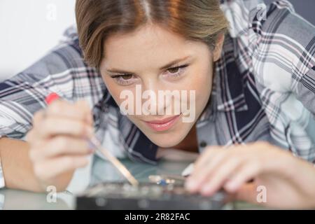 close view of female computer technician Stock Photo