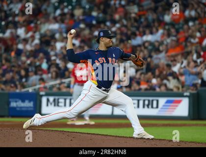 Houston Astros relief pitcher Bryan Abreu, left, and third baseman