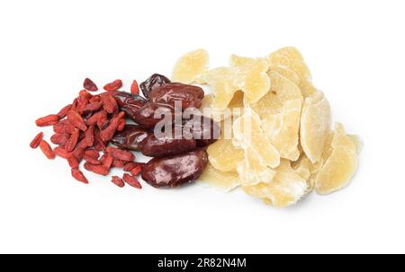 Pile of different tasty dried fruits on white background Stock Photo